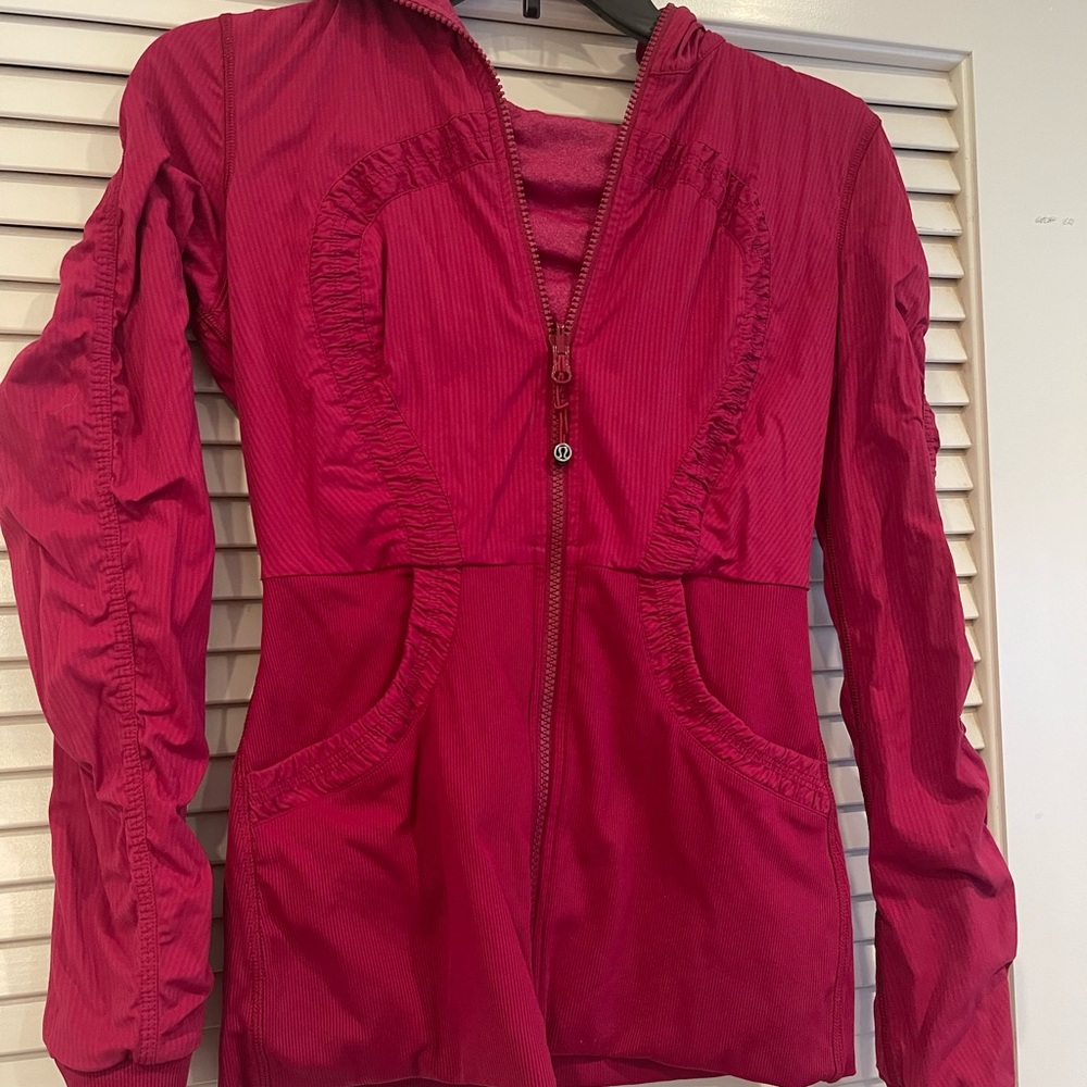 Cranberry Red Lulu zip up hooded jacket.